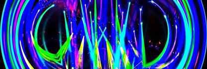 Image of band blurred into a circular, multicolored swirl