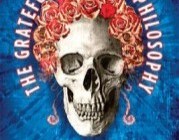 Book cover with image of skull with roses. Reads "The Grateful Dead and Philosophy Edited by Steven Gimbel"